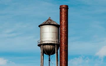 Water tower, laundry and utility fixture metal painting in Tempe, AZ