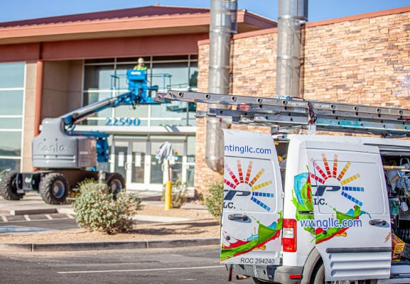 Professional painting services on a commercial building